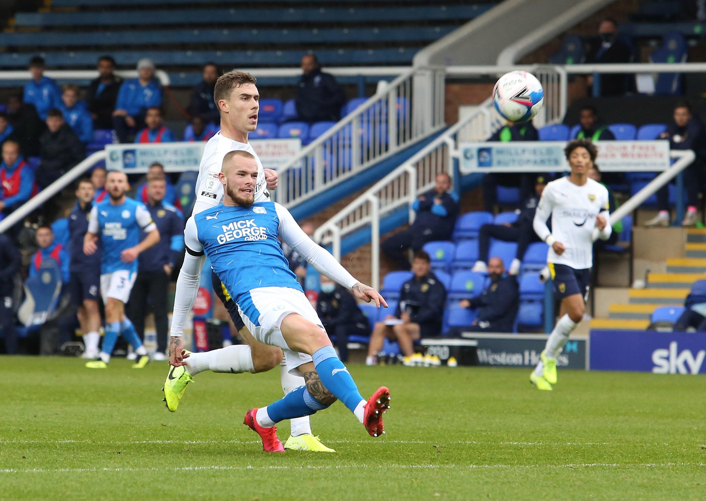 LIVE: PETERBOROUGH UNITED 2, OXFORD UNITED 0: Ward lobs Posh in front after vital Pym saves. LIVE: PETERBOROUGH UNITED 2, OXFORD UNITED 0: Ward lobs Posh in front after vital Pym saves.