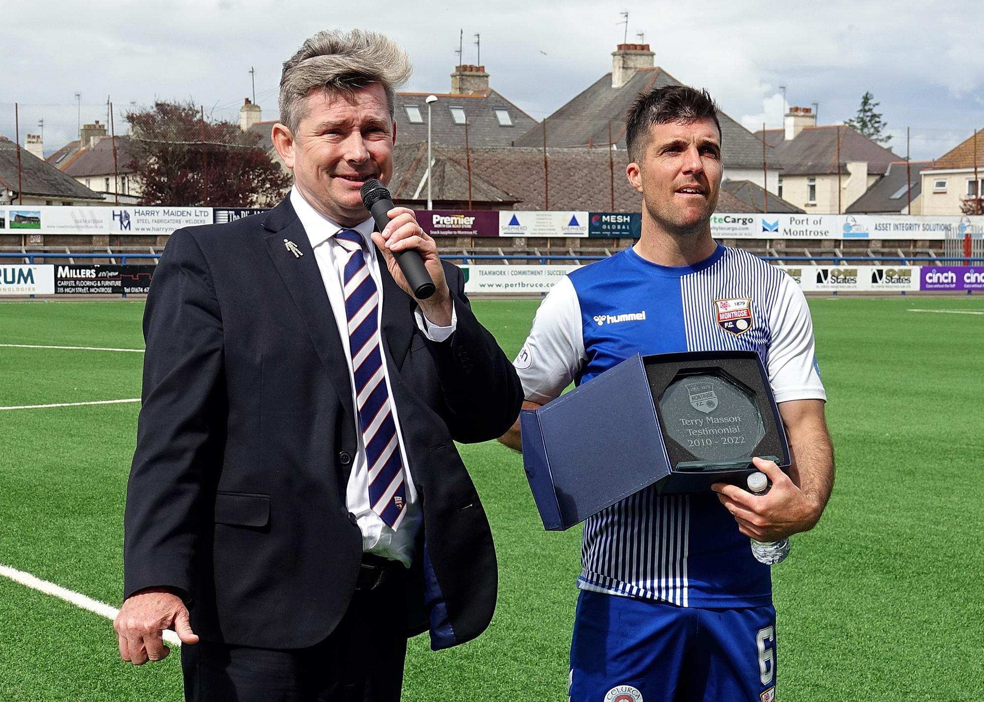 Terry Masson being presented with his gift after his testimonial game against Arbroath.jpg